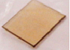 LSAT (100) 10x10x0.5 mm Square Substrate - 2 side epi polished, Anneaing in oxygen - LSATa101005S2brown